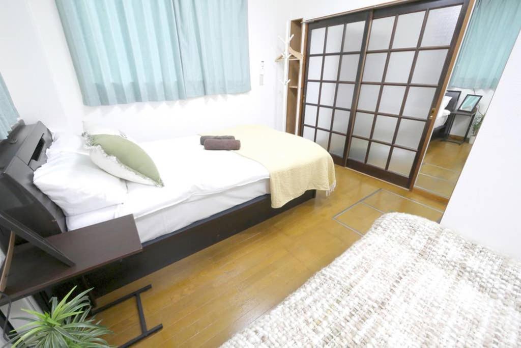 マスク配布ありa5 新宿10分 10人宿泊可能 出張在宅勤務に最適!!宿泊型テレワークスペース!!Wifi完備 回線安定してます!!長期宿泊受付中 Tokio Zewnętrze zdjęcie